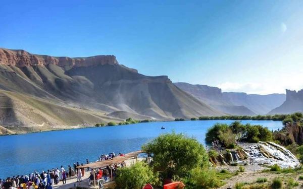 Band-e-Amir is Afghanistan's first national park, featuring six deep blue lakes separated by natural dams made of travertine. The striking contrast between the sapphire water and the red-hued limestone cliffs creates a surreal landscape. It is often referred to as the "Grand Canyon of Afghanistan" and is a must-see for nature lovers and photographers.