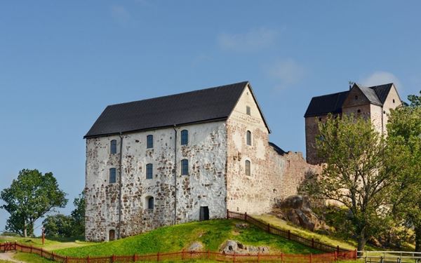 Kastelholm Castle is a well-preserved medieval fortress located in Sund, Aland. Built in the 14th century, it played a key role in Nordic history and served as a royal residence. Today, it offers visitors a journey through time with its stone walls, historic exhibitions, and picturesque waterfront setting, making it the most iconic historical landmark on the islands.