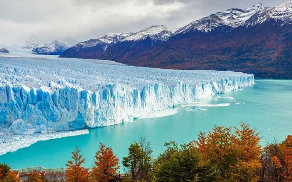 Located in Los Glaciares National Park, the Perito Moreno Glacier is one of the few advancing glaciers in the world. Visitors can witness massive chunks of ice calving into Lake Argentino with a thunderous roar. The network of wooden walkways and boat tours provide an up-close view of this majestic blue ice giant. It is a breathtaking natural wonder that showcases the raw power of the Patagonian wilderness.