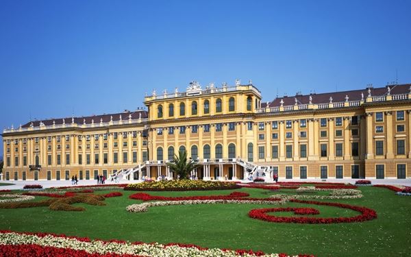 Located in Vienna, Schönbrunn Palace is a former imperial summer residence and a masterpiece of Baroque architecture. Its vast gardens, magnificent interior rooms, and the world's oldest zoo make it Austria's most visited landmark. The palace tells the story of the Habsburg monarchs and provides a stunning glimpse into the country’s regal past.
