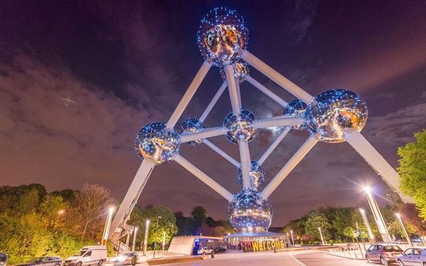 Built for the 1958 Brussels World’s Expo, the Atomium is a giant stainless steel model of an iron crystal magnified 165 billion times. This futuristic landmark offers panoramic views of the city from its topmost sphere. It stands as a symbol of mid-century modernism and scientific progress, housing various exhibitions and a unique restaurant with breathtaking vistas.
