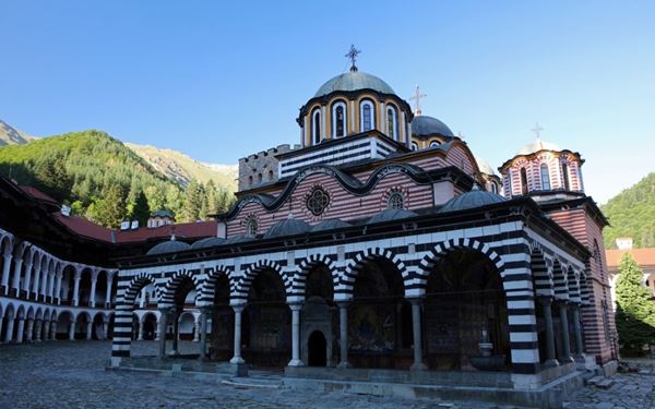 Founded in the 10th century, Rila Monastery is a masterpiece of the Bulgarian National Revival and a UNESCO World Heritage site. Located in the Rila Mountains, it features colorful frescoes, intricate wood carvings, and a rich library. The monastery has been a spiritual and cultural hub for centuries, offering a peaceful atmosphere amidst stunning alpine scenery.