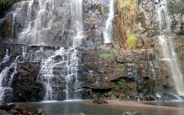 The Karera Waterfalls are a series of four spectacular cascades hidden within a lush forest in southeastern Burundi. The site offers a peaceful environment for hiking and birdwatching, with the sound of rushing water echoing through the trees. It is a hidden natural gem that showcases the country’s green landscapes and offers a refreshing escape into the wild and scenic beauty of the Burundian highlands.