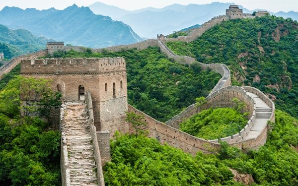 The Great Wall of China is an ancient architectural masterpiece stretching thousands of miles across northern China. The Badaling and Mutianyu sections near Beijing are the most popular for their well-preserved towers and stunning mountain views. As one of the New Seven Wonders of the World, it represents the grand history and resilience of Chinese civilization.