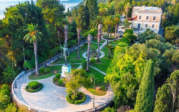 Built by Empress Elisabeth of Austria, the Achilleion Palace is a magnificent neoclassical villa dedicated to the Greek hero Achilles. The palace features grand statues, lush gardens, and ornate interiors that reflect the Empress’s obsession with Greek mythology. Located on a hill in Gastouri, it offers breathtaking views of the coast and provides a fascinating look into the royal European history of Corfu.