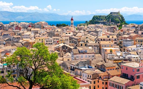 Corfu Old Town is a UNESCO World Heritage site characterized by its elegant Venetian-style architecture, narrow "kantounia" alleys, and grand fortresses. The Liston promenade and Spianada square reflect the island’s cosmopolitan history under French and British rule. It is a charming and historic labyrinth of churches and museums, offering a sophisticated Mediterranean atmosphere in the heart of the Ionian Sea.