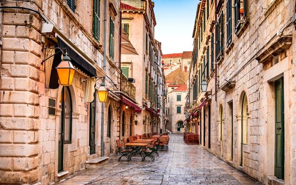 Known as the "Pearl of the Adriatic," Dubrovnik’s Old Town is famous for its massive stone walls that encircle the historic center. Visitors can walk along the ramparts for spectacular views of the red-roofed buildings and the turquoise sea. Its well-preserved Gothic, Renaissance, and Baroque architecture makes it one of the world's most beautiful walled cities.