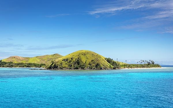 The Mamanuca Islands are a picture-perfect archipelago of about 20 islands known for their crystal-clear waters and vibrant coral reefs. These islands served as the filming location for "Cast Away." It is a paradise for surfers, snorkelers, and those seeking luxury island resorts, offering the quintessential South Pacific tropical experience.