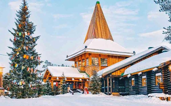 Located on the Arctic Circle in Rovaniemi, Santa Claus Village is the official home of Santa. Visitors can meet Santa year-round, cross the Arctic Circle line, and send letters from the official post office. In winter, the village is a magical wonderland of snow, reindeer rides, and Northern Lights, making it a dream destination for families.
