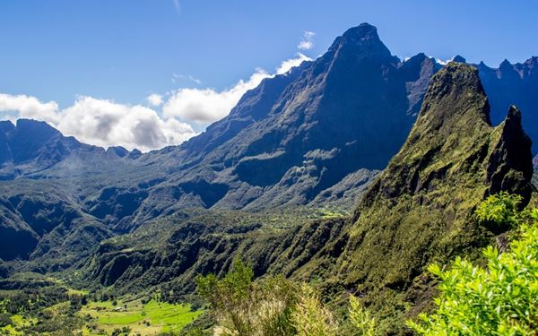 Accessible only by foot or helicopter, the Cirque de Mafate is a remote and breathtaking volcanic caldera nestled in the heart of the island. It is a hiker's paradise, featuring rugged mountains, deep valleys, and isolated hamlets where traditional Creole culture remains untouched. The absolute silence and majestic scenery provide a profound sense of isolation and adventure for those seeking to connect with pure nature.