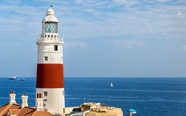 Europa Point is the southernmost tip of Gibraltar, where the Atlantic Ocean meets the Mediterranean Sea. It features the iconic Trinity Lighthouse and the Ibrahim-al-Ibrahim Mosque. On clear days, visitors can enjoy stunning views across the Strait of Gibraltar to the coast of North Africa. It is a place of geographical and cultural significance, marking the gateway to the Mediterranean.