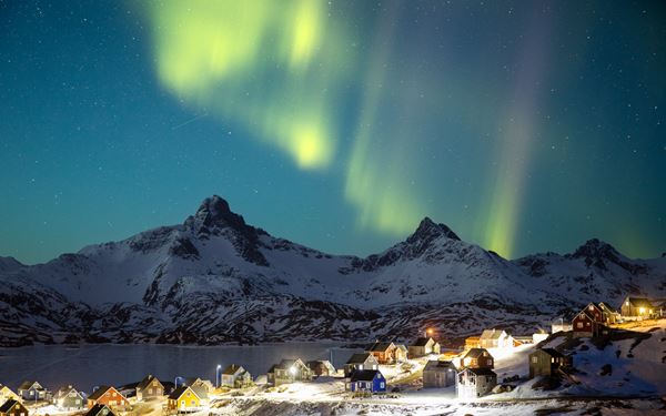 Tasiilaq is the largest town in East Greenland, a region known for its rugged, untouched beauty and strong hunter traditions. Surrounded by steep mountains and ice-filled fjords, it offers world-class dog sledding, hiking, and boat tours to see calving glaciers. It is a destination for true adventurers seeking to experience the raw, isolated, and majestic spirit of the Arctic wilderness.