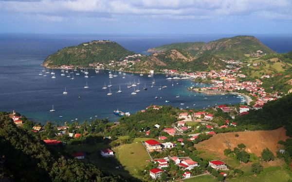 Les Saintes is a small archipelago of islands known for its charming fishing villages and one of the most beautiful bays in the world. Visitors can explore Fort Napoléon, enjoy pristine beaches like Pompierre, and experience a relaxed, traditional French Caribbean lifestyle. It is a hidden gem for sailing, snorkeling, and enjoying authentic island culture.