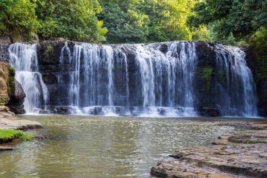 Talofofo Falls is a beautiful two-tiered waterfall located in a lush jungle setting in southern Guam. The park also includes a reproduction of a traditional CHamoru village and the famous Yokoi’s Cave, where a Japanese soldier hid for 28 years after WWII. It is a destination that combines natural tropical beauty with fascinating historical and cultural insights into the island's past.