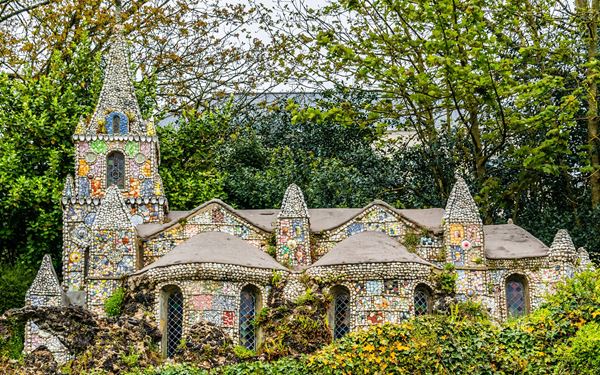 The Little Chapel is a unique and charming landmark built by Brother Déodat in 1914. It is famous for being one of the smallest chapels in the world and is intricately decorated with thousands of pieces of broken china, shells, and colorful pebbles. This labor of love is a work of art and a site of peace, reflecting a whimsical and creative spiritual devotion that attracts visitors from all over the globe.