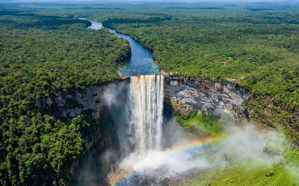 Kaieteur Falls is one of the world's most powerful and highest single-drop waterfalls, plunging 226 meters into the Potaro River. Located in the heart of the Amazon rainforest, it is five times higher than Niagara Falls. The sheer volume of water and the surrounding pristine wilderness create an awe-inspiring spectacle, making it the most iconic and breathtaking natural landmark in Guyana.