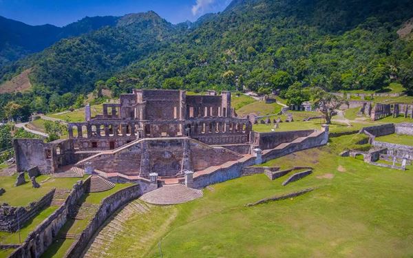 Located at the foot of the Citadelle, Sans-Souci was the grand royal residence of King Henri I. Once known as the "Versailles of the Caribbean," the ruins still showcase the elegance and ambition of the early Haitian monarchy. Exploring the gardens, staircases, and arched windows provides a fascinating and poignant look at the cultural and architectural peak of post-independence Haiti.