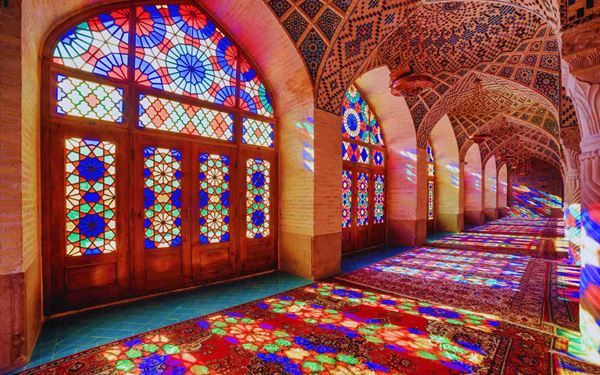 Also known as the "Pink Mosque" in Shiraz, this building is famous for its extensive use of stained glass in its facade. When the morning light shines through the windows, the interior is transformed into a kaleidoscope of colors reflected on Persian carpets. It is a stunning example of Qajar-era architecture and one of the most photographed and magical sites in Iran.