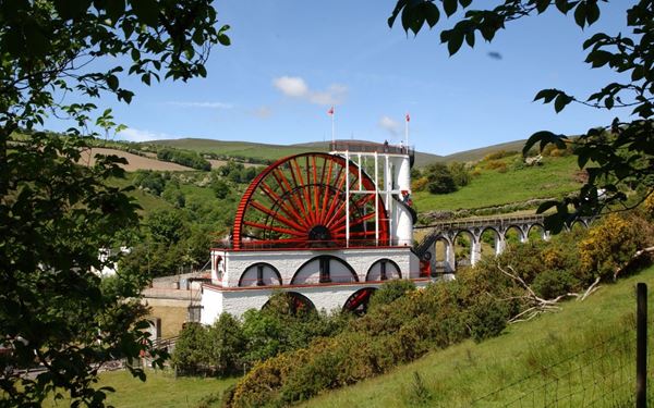 The Laxey Wheel, also known as Lady Isabella, is the largest working waterwheel in the world. Built in 1854 to pump water from the mines, it remains a masterpiece of Victorian engineering. Climbing to the top platform offers panoramic views of the Glen Mooar valley. It is a proud symbol of the island's industrial heritage and a must-visit for its sheer scale and historic charm.