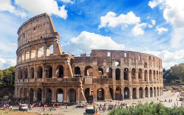 The Colosseum is the largest ancient amphitheater ever built and a global icon of Imperial Rome. Once the site of gladiatorial contests, it remains a marvel of Roman engineering. Exploring its tiers and underground chambers allows visitors to step back in time and imagine the grandeur and drama of life in the Roman Empire.