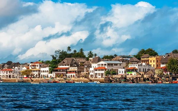 Lamu is the oldest and best-preserved Swahili settlement in East Africa and a UNESCO World Heritage site. Built from coral stone and mangrove timber, the town features narrow streets where donkeys remain the main mode of transport. Its rich maritime history, carved wooden doors, and vibrant festivals reflect centuries of trade between Africa, Arabia, and India in a peaceful island setting.