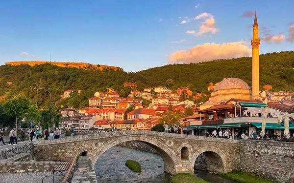 Prizren is often called the cultural capital of Kosovo, known for its well-preserved Ottoman architecture and the iconic Stone Bridge. Walking through its narrow streets leads to historic mosques, churches, and the Prizren Fortress, which offers panoramic views of the city. Its vibrant atmosphere and the annual Dokufest film festival make it a must-visit for history and art lovers.