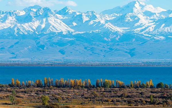 Issyk-Kul is the second-largest alpine lake in the world, surrounded by the snow-capped Tian Shan mountains. Known as the "Pearl of Central Asia," its salty water never freezes. It is a popular destination for swimming, sailing, and exploring ancient Silk Road history, offering a serene and majestic natural escape in the heart of the mountains.