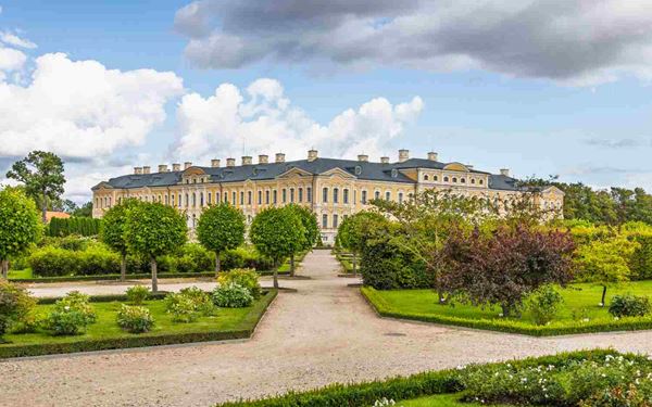 Rundāle Palace is a magnificent Baroque and Rococo masterpiece designed by Bartolomeo Rastrelli, the architect of the Winter Palace. It features opulent state rooms and a vast, beautifully landscaped rose garden. Often called the "Versailles of the Baltics," it offers a glimpse into the grand life of the Dukes of Courland and is one of Latvia’s most significant and beautiful historical monuments.