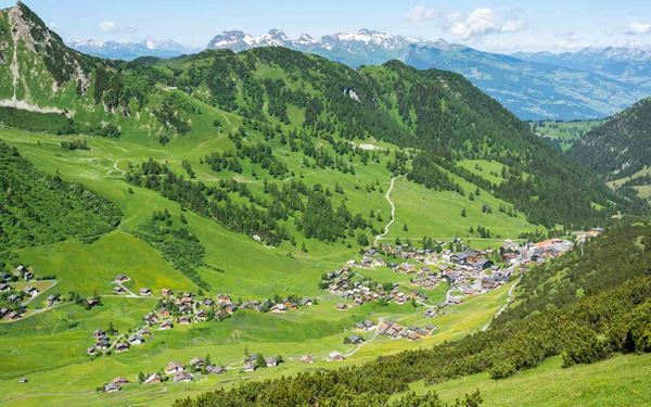 Malbun is the main mountain resort of Liechtenstein, offering a family-friendly atmosphere for skiing in winter and hiking in summer. Nestled in a scenic alpine valley, it is known for its fresh air and peaceful trails. Visitors can take a chairlift to the Sareis ridge for a panoramic view of the Alps, experiencing the tranquil and majestic beauty of this tiny nation's high-altitude landscape.