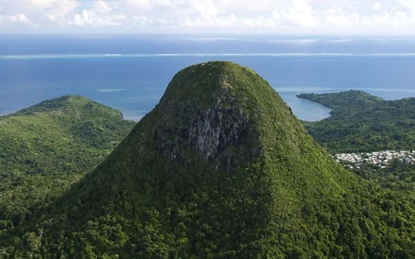 Mount Choungui is a dramatic basaltic peak that dominates the southern landscape of Mayotte. The steep climb to the summit is rewarded with the most spectacular 360-degree views of the entire island, the surrounding coral reef, and the deep blue lagoon. It is a must-visit for hikers and adventurers, providing a breathtaking perspective on the island's volcanic origin and its stunning maritime geography.