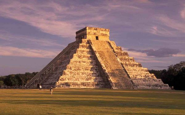 Chichen Itza is one of the New Seven Wonders of the World and a masterpiece of Maya-Toltec architecture. The iconic El Castillo pyramid is designed with astronomical precision, reflecting the shadows of a serpent during the equinox. Exploring the Great Ball Court and the Sacred Cenote offers a deep dive into the complex religious and scientific world of the ancient Maya civilization in the Yucatan.