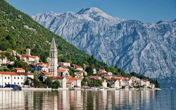 Often described as Europe's southernmost fjord, the Bay of Kotor is a breathtaking submerged river canyon surrounded by limestone cliffs. The UNESCO-listed town of Kotor features medieval walls and narrow streets, while the islet of Our Lady of the Rocks offers a unique spiritual history. It is a stunning fusion of dramatic natural beauty and Venetian-inspired architecture along the Adriatic coast.