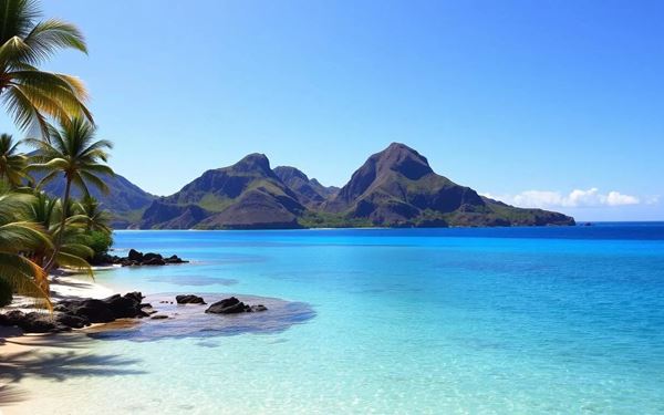 Rendezvous Bay is Montserrat's only white-sand beach, accessible only by a challenging hike or a boat ride. This secluded paradise offers crystal-clear water and excellent snorkeling in a peaceful, untouched setting. Surrounded by steep cliffs and lush tropical vegetation, it is the perfect escape for those seeking tranquility and the natural beauty of the Emerald Isle of the Caribbean.