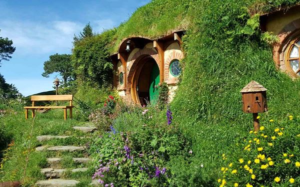 Located in Matamata, the Hobbiton Movie Set is a must-visit for fans of The Lord of the Rings and The Hobbit trilogies. Visitors can take a guided tour through the lush pastures of the Shire, see the iconic Hobbit Holes, and enjoy a drink at the Green Dragon Inn. It is a magical and meticulously crafted destination that brings Middle-earth to life in the heart of New Zealand.
