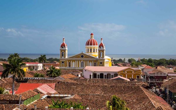 Granada is a beautiful colonial city on the shores of Lake Nicaragua, known for its well-preserved Spanish architecture and vibrant yellow cathedral. Visitors can explore the nearby Islets of Granada by boat or climb the bell tower of Iglesia de La Merced for panoramic views. Its colorful streets, historic plazas, and rich cultural heritage make it the most charming city in the country.