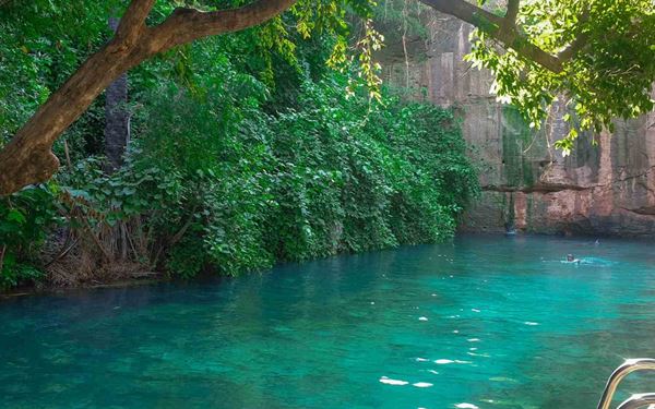 Yankari is Nigeria's most popular wildlife park, home to the country's largest population of elephants and various species of monkeys and antelopes. A highlight is the Wikki Warm Springs, a natural crystal-clear spring where visitors can swim in constant 31°C water. It offers a unique combination of wildlife observation and relaxation, making it a premier destination for eco-tourism in West Africa.