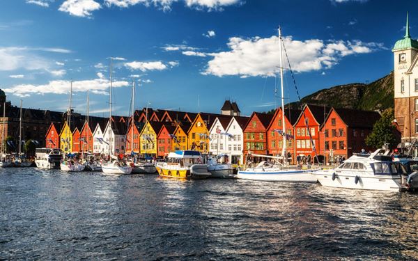 Bryggen is the historic harbor district of Bergen, featuring a series of colorful wooden commercial buildings that date back to the Hanseatic League. This UNESCO World Heritage site is the heart of the city, filled with boutiques, artist studios, and restaurants. Walking through its narrow alleyways offers a glimpse into Bergen’s medieval past and its long history as a major European trading port.