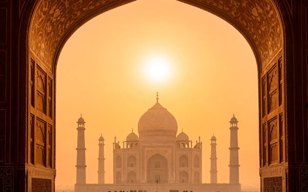 Built in 1673, the Badshahi Mosque in Lahore is one of the most iconic examples of Mughal architecture. Its massive red sandstone walls and white marble domes dominate the city's skyline. The vast courtyard can accommodate over 100,000 worshippers. It stands as a symbol of Pakistan's rich Islamic heritage and the grandeur of the Mughal Empire at its cultural peak.