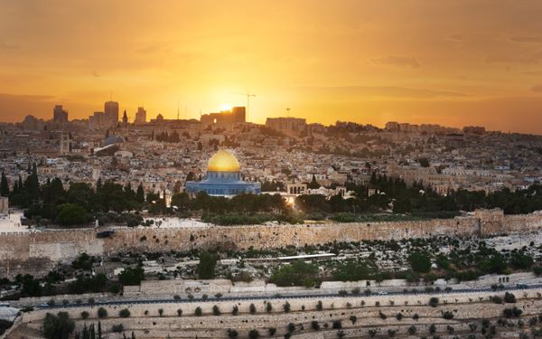 The Dome of the Rock is an iconic Islamic shrine located on the Temple Mount in the Old City of Jerusalem. Its magnificent golden dome and intricate blue tile work are masterpieces of early Islamic architecture. As one of the oldest extant works of Islamic art, it is a site of profound religious importance and a stunning symbol of the city's complex and sacred history.