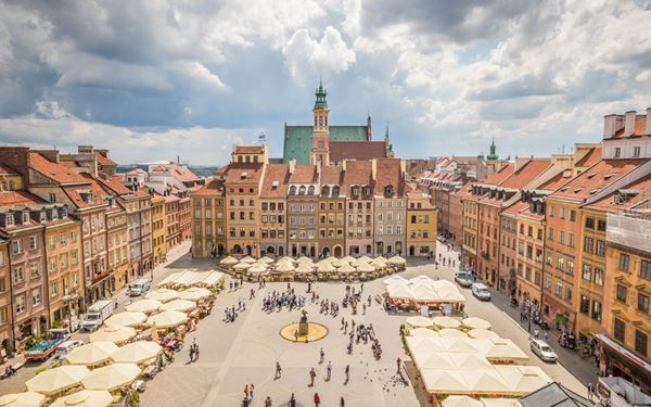 Warsaw's Old Town is a remarkable example of reconstruction, having been painstakingly rebuilt after being nearly destroyed in WWII. Its heart is the colorful Market Square, filled with traditional restaurants and the historic Royal Castle. This UNESCO site blends the charm of the past with the resilience of the present, making it a vibrant and historic center for any visitor to Poland.