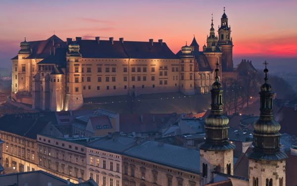 Perched on a hill in Krakow, Wawel Royal Castle is a symbol of Polish national identity and a UNESCO World Heritage site. It features a stunning mix of Romanesque, Gothic, and Renaissance architecture. Visitors can explore the Royal Private Apartments, the Crown Treasury, and the historic cathedral where Polish kings were crowned, offering a deep journey through Poland's royal history.