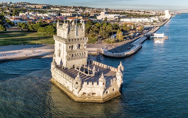 Located in Lisbon, the Belem Tower is a stunning example of the Manueline architectural style and a symbol of the Age of Discovery. This UNESCO World Heritage site served as a ceremonial gateway to Lisbon and a defensive fortress. Standing on the banks of the Tagus River, its intricate stone carvings and historic significance make it one of Portugal’s most photographed landmarks.