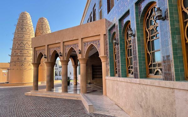 Katara is Qatar's cultural hub, featuring a grand Roman-style amphitheater, beautiful mosques with intricate blue tiles, and numerous art galleries. It serves as a space for international festivals and theatrical performances. With its scenic beachfront and diverse dining options, Katara is a premier destination for those seeking to explore the artistic and cultural diversity of the region.