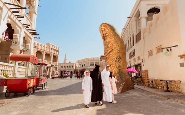 Souq Waqif is the traditional heart of Doha, a vibrant marketplace where visitors can find spices, handicrafts, and local art. The maze of alleyways, traditional mud-rendered buildings, and the nearby Falcon Hospital provide an authentic glimpse into Qatari culture. It is the perfect place to experience Middle Eastern hospitality and enjoy traditional cuisine in a lively atmosphere.