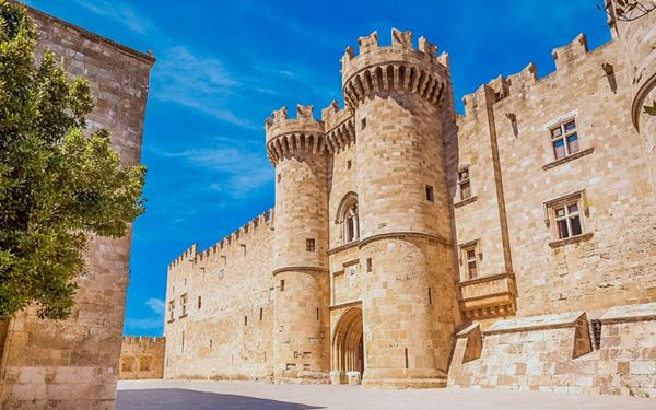 The Palace of the Grand Master is a massive medieval fortress located at the highest point of the Old Town of Rhodes. Originally built by the Knights Hospitaller, it features impressive defensive walls, grand courtyards, and beautiful mosaic floors. As a UNESCO World Heritage site, it stands as a powerful reminder of the island’s significance as a crusader stronghold in the Mediterranean.