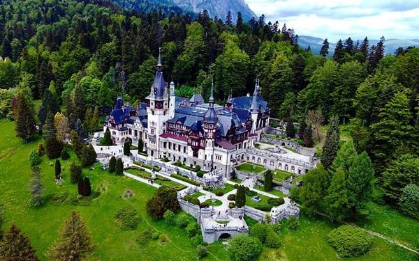 Located in the mountain resort of Sinaia, Peles Castle is a Neo-Renaissance masterpiece and considered one of the most beautiful castles in Europe. Built as a summer residence for the Romanian royal family, its ornate rooms feature exquisite woodcarvings, stained glass, and valuable art collections. The castle’s fairytale architecture and alpine setting make it a jewel of Romanian heritage.