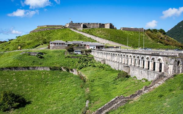 Brimstone Hill Fortress is a UNESCO World Heritage site known as the "Gibraltar of the West Indies." This massive stone fortification offers panoramic views of the Caribbean Sea and neighboring islands. It is a masterpiece of military engineering and a testament to the island's strategic importance during the colonial era, preserving centuries of Caribbean history.