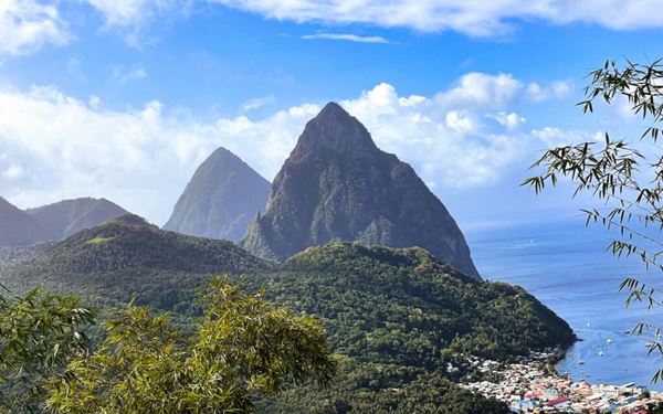 The Pitons are two iconic volcanic spires, Gros Piton and Petit Piton, that rise dramatically from the sea. This UNESCO World Heritage site is the most famous landmark of Saint Lucia. Visitors can hike to the summit of Gros Piton for breathtaking views or admire the twin peaks from the water. They represent the raw, majestic natural beauty and volcanic origin of the island.
