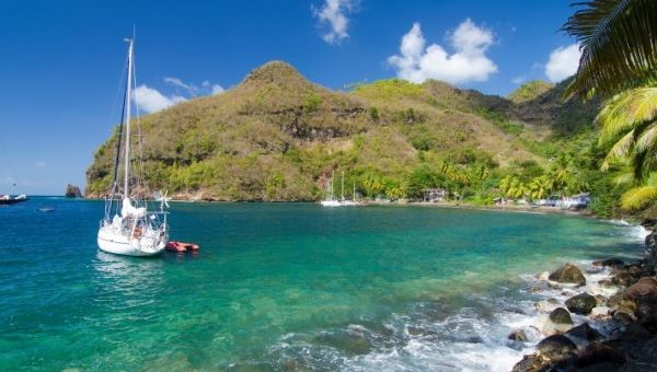 Wallilabou Bay is a picturesque cove famous for being a primary filming location for "Pirates of the Caribbean." Visitors can still see remnants of the movie sets and explore the small museum dedicated to the film. The calm waters and dramatic rock formations make it a popular spot for sailors and movie fans seeking to relive the adventures of Captain Jack Sparrow.