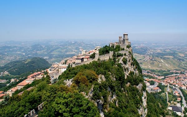 The Guaita Tower is the oldest and most famous of the three towers of San Marino, perched on the highest peak of Mount Titano. Built in the 11th century, it served as a fortress and a prison. Exploring its battlements offers the most iconic panoramic views of the entire republic and the surrounding Italian countryside, representing the nation's long history of independence and liberty.